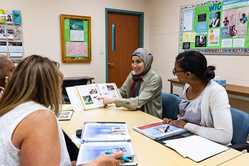WIC clinic staff discuss best practices for serving participants at an internal training workshop.