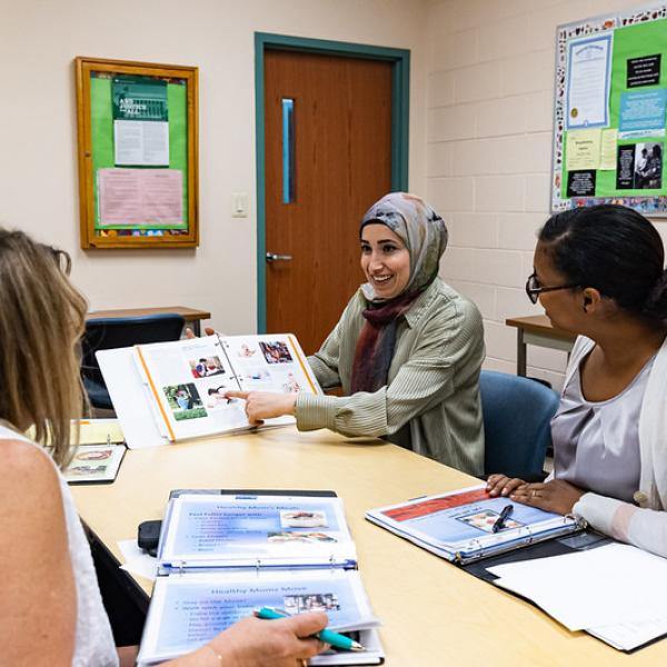 WIC clinic staff discuss best practices for serving participants at an internal training workshop.